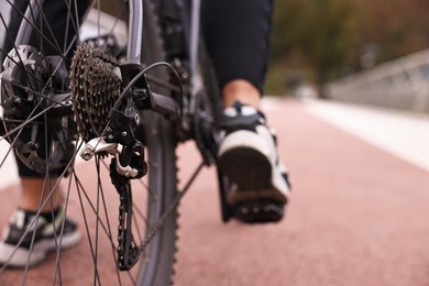 Man with bicycle outdoors, closeup. Healthy lifestyle