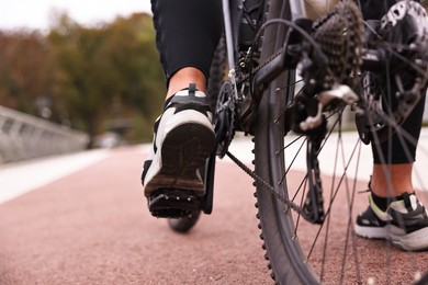 Photo of Man with bicycle outdoors, closeup. Healthy lifestyle