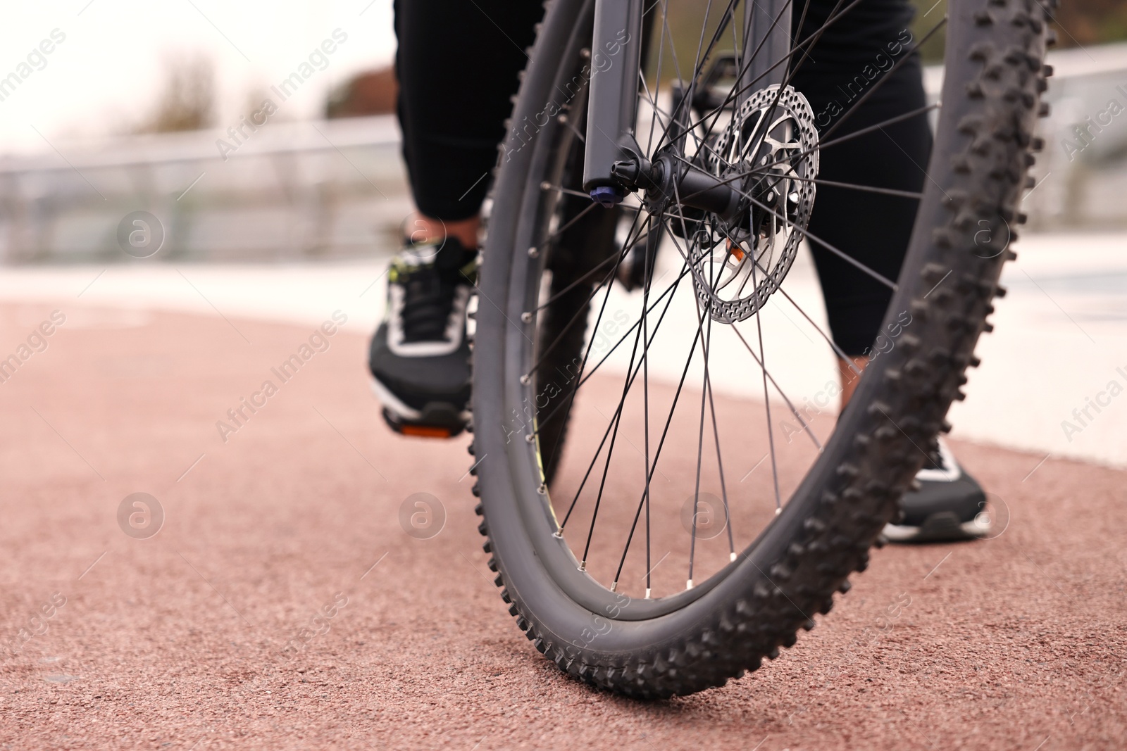 Photo of Man with bicycle outdoors, closeup. Healthy lifestyle