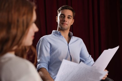 Photo of Professional actors rehearsing on stage in theatre