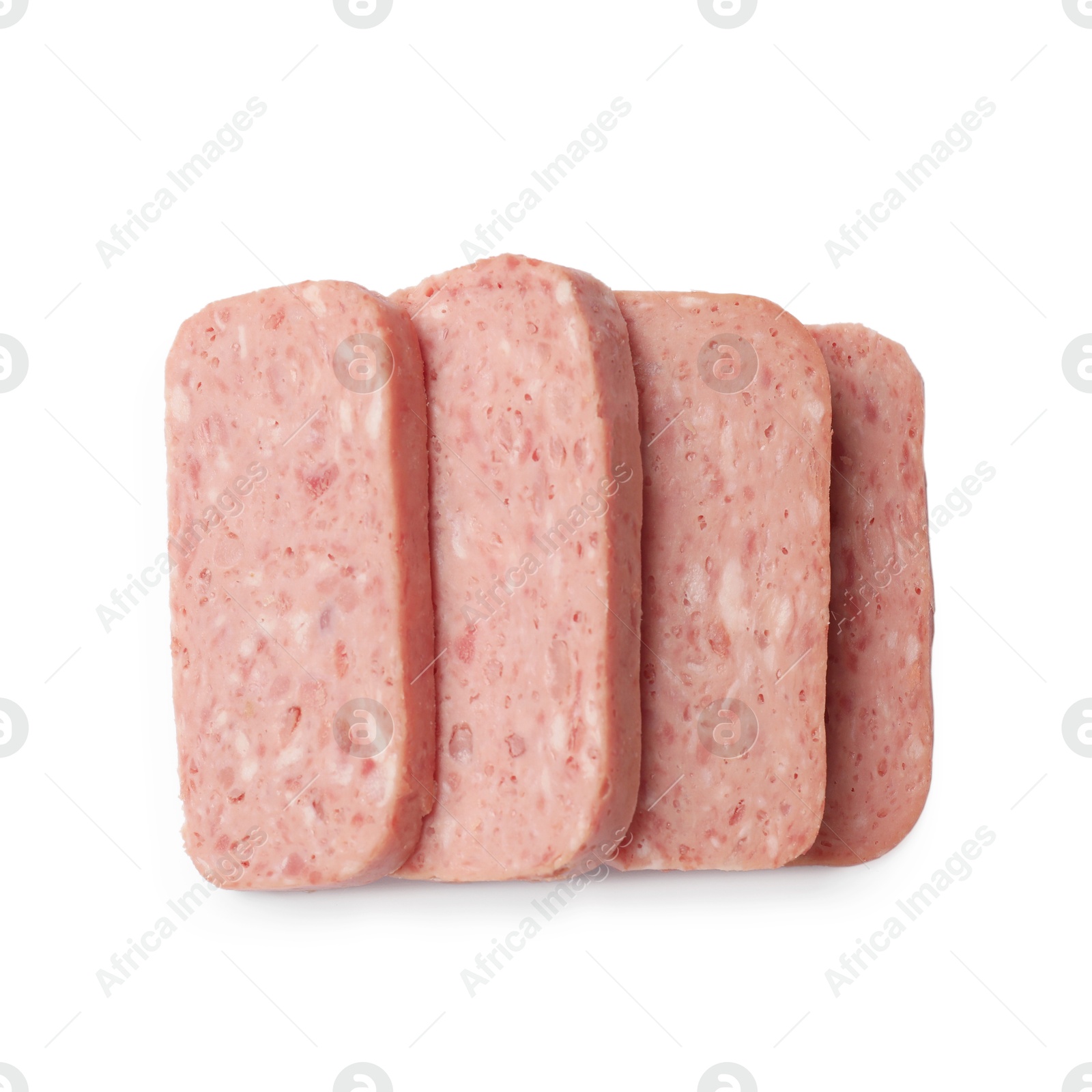 Photo of Pieces of canned meat isolated on white, top view