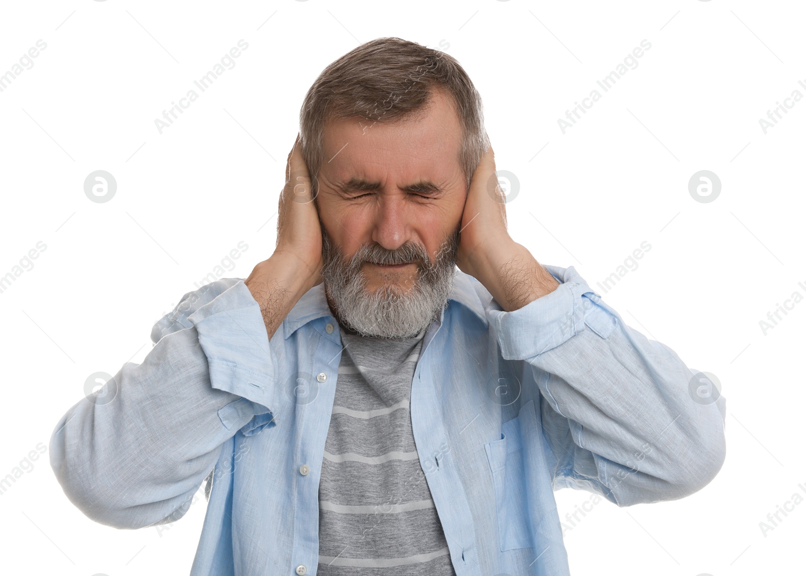 Photo of Senior man covering his ears on white background