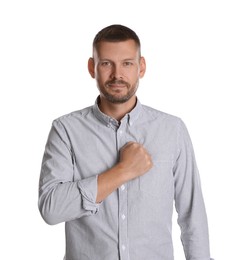 Photo of Man making promise on white background. Oath gesture