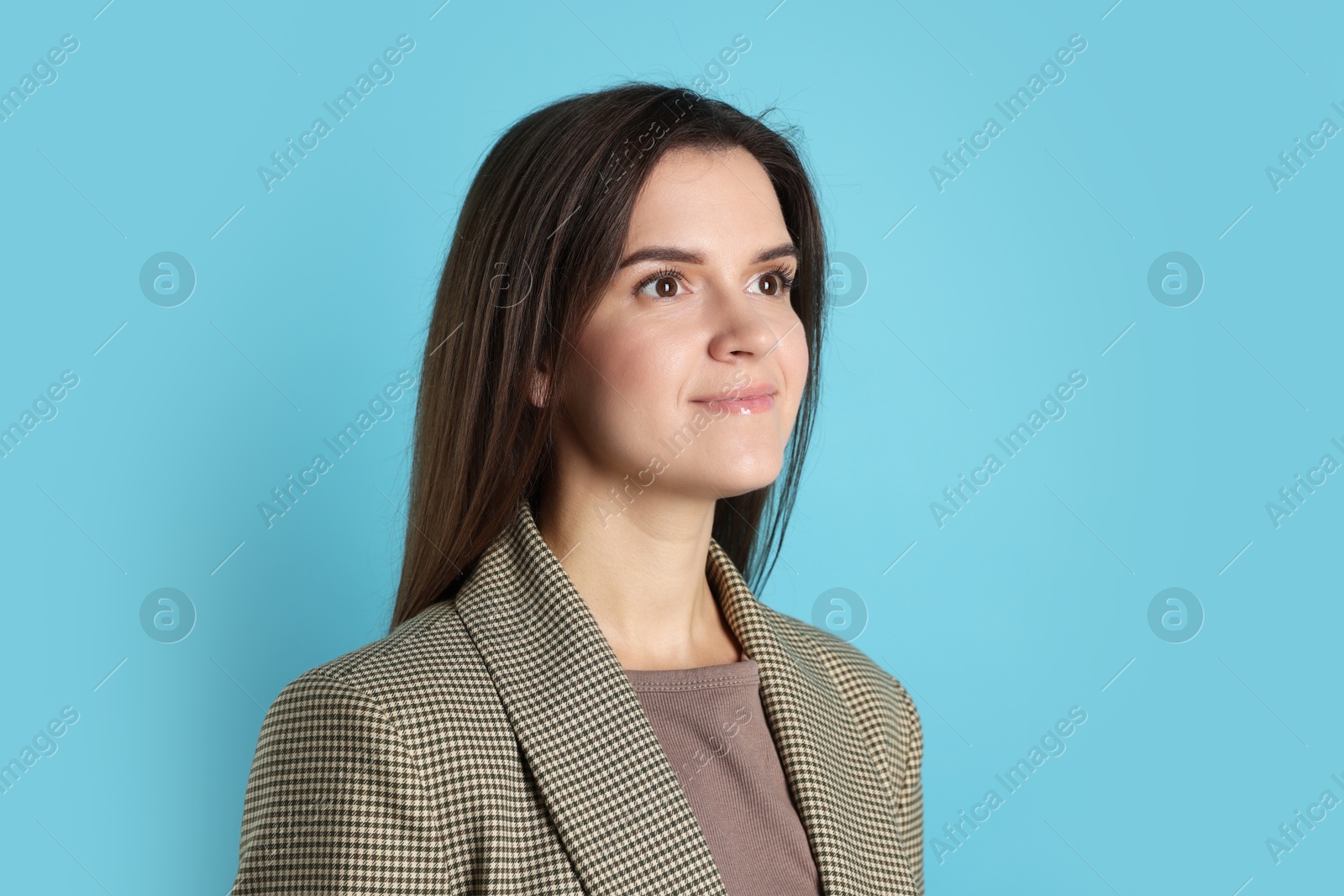 Photo of Portrait of banker on light blue background