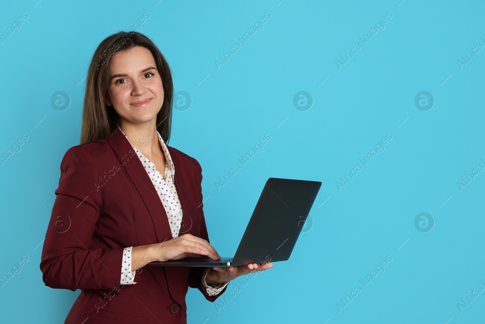 Photo of Banker with laptop on light blue background, space for text