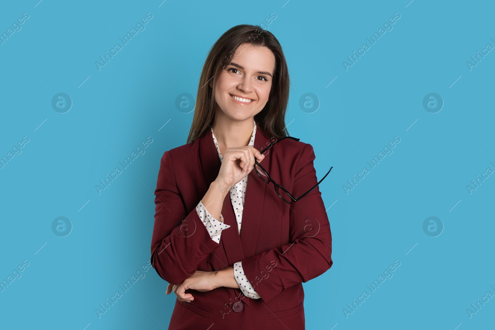 Photo of Banker with glasses on light blue background