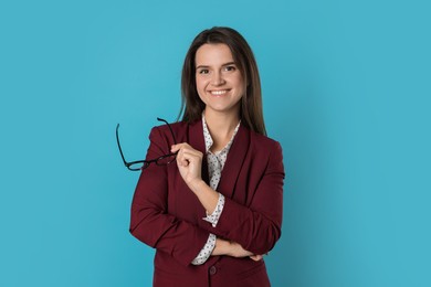 Photo of Banker with glasses on light blue background