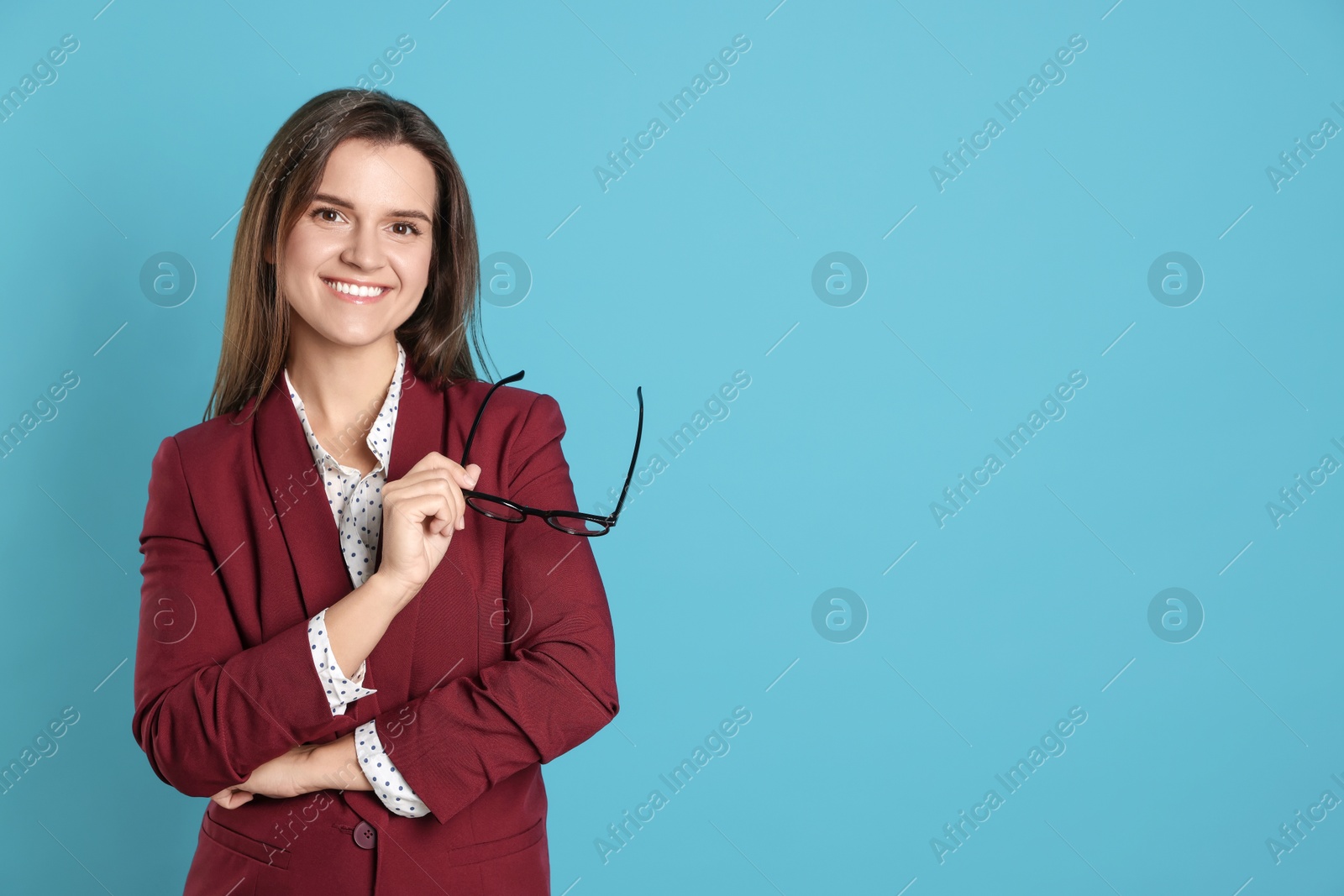 Photo of Banker with glasses on light blue background, space for text