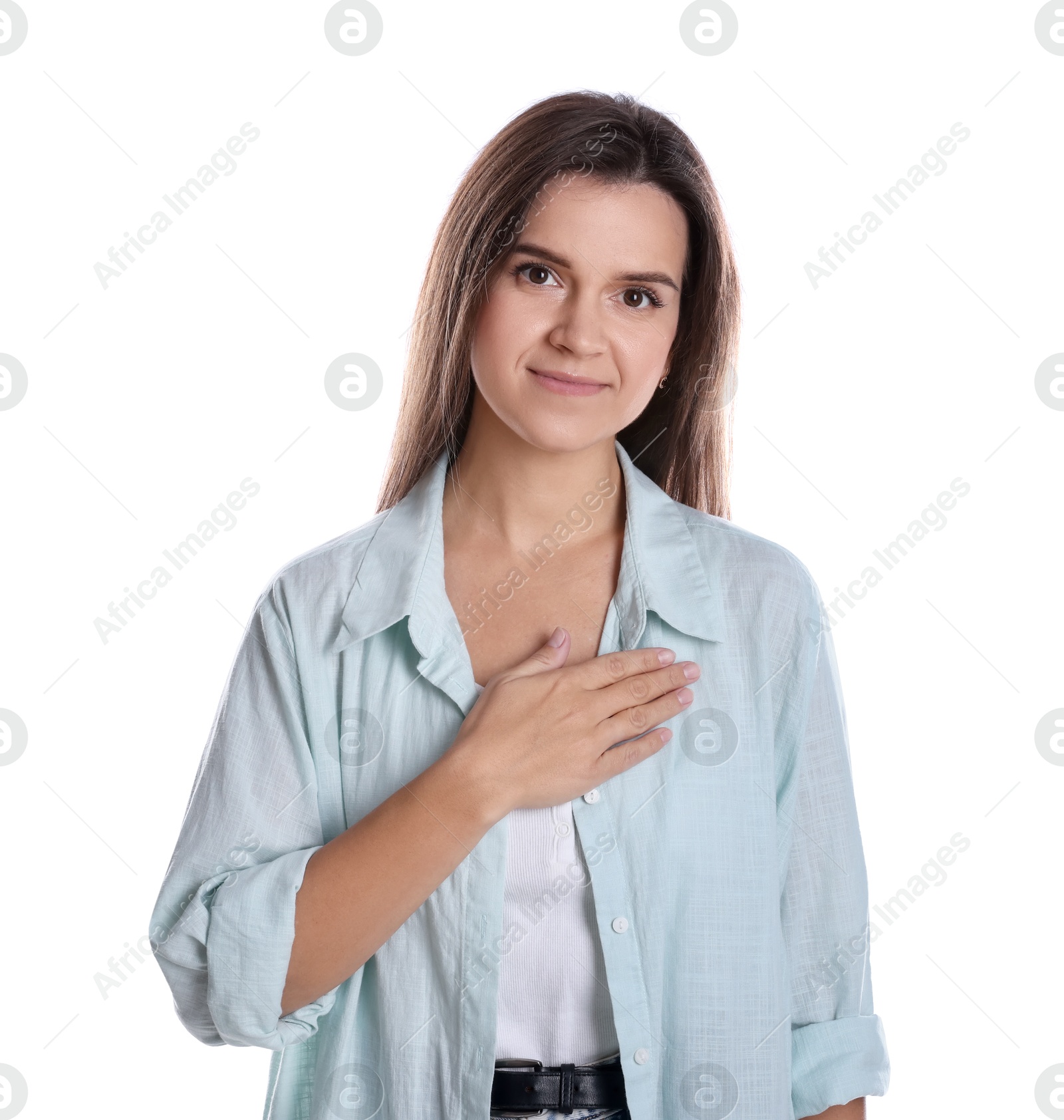 Photo of Woman making promise on white background. Oath gesture