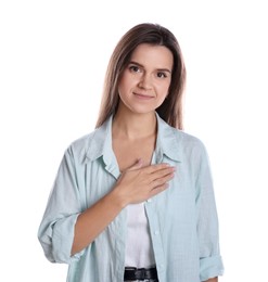 Photo of Woman making promise on white background. Oath gesture