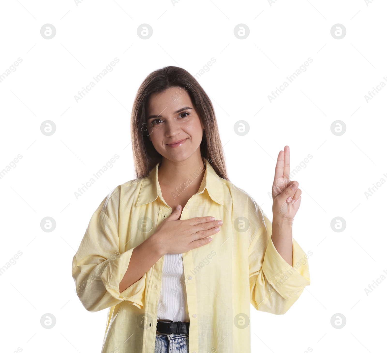 Photo of Woman showing oath gesture on white background. Making promise