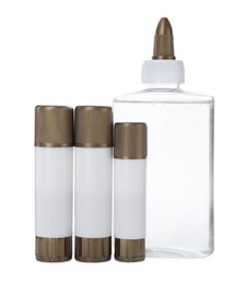 Photo of Different glue sticks and bottle isolated on white