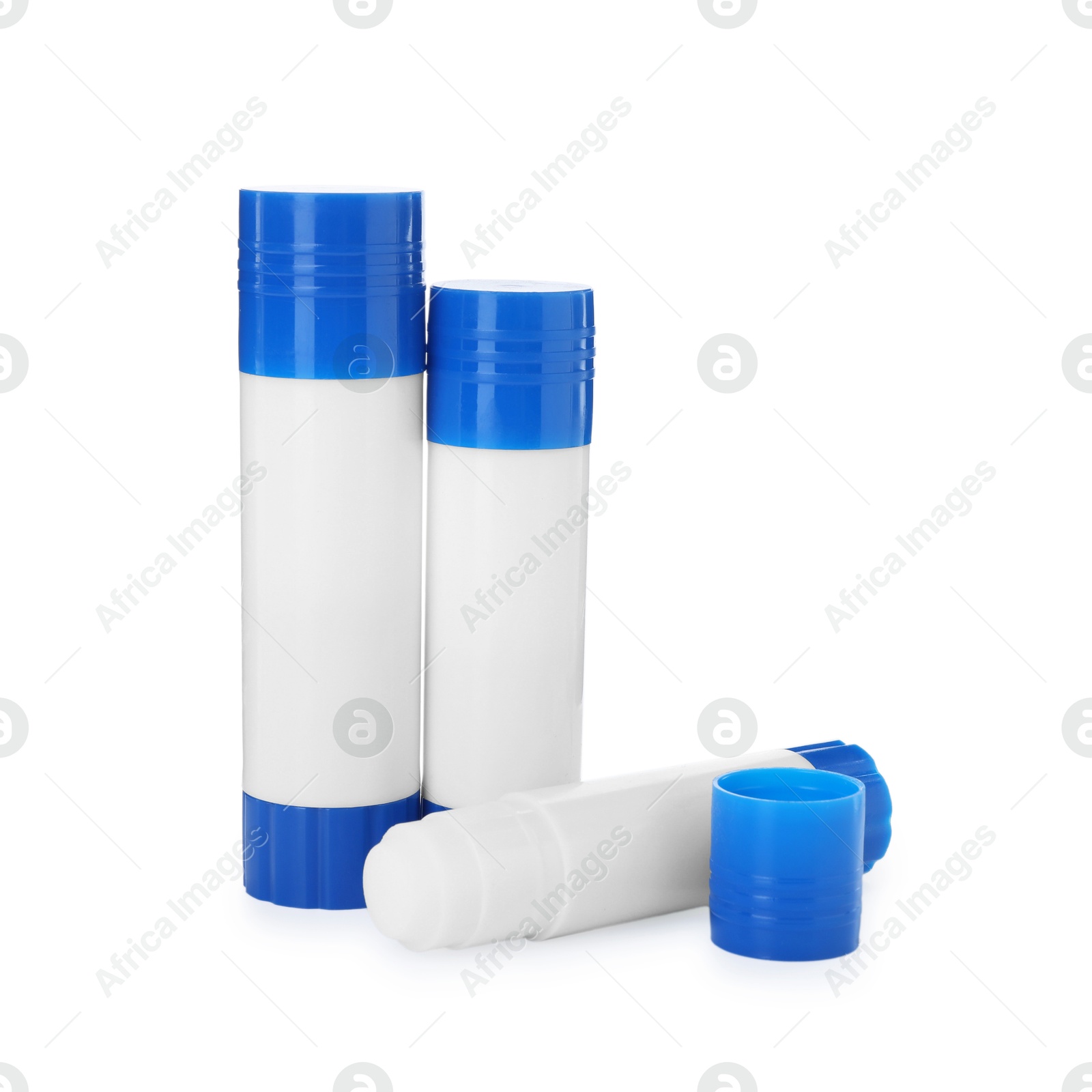 Photo of Many different glue sticks isolated on white