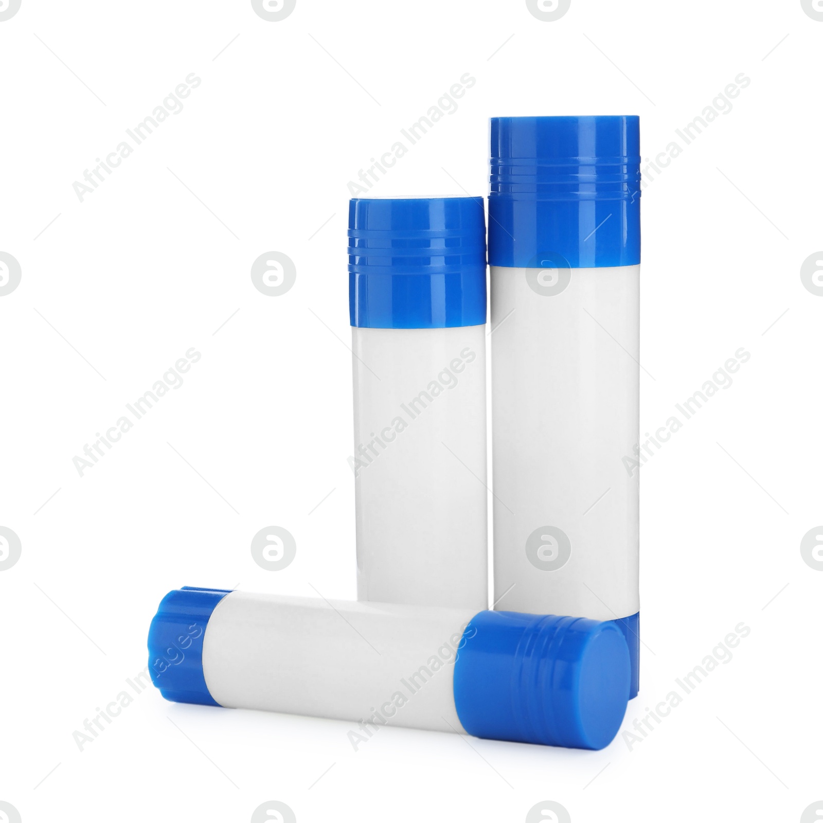 Photo of Many different glue sticks isolated on white