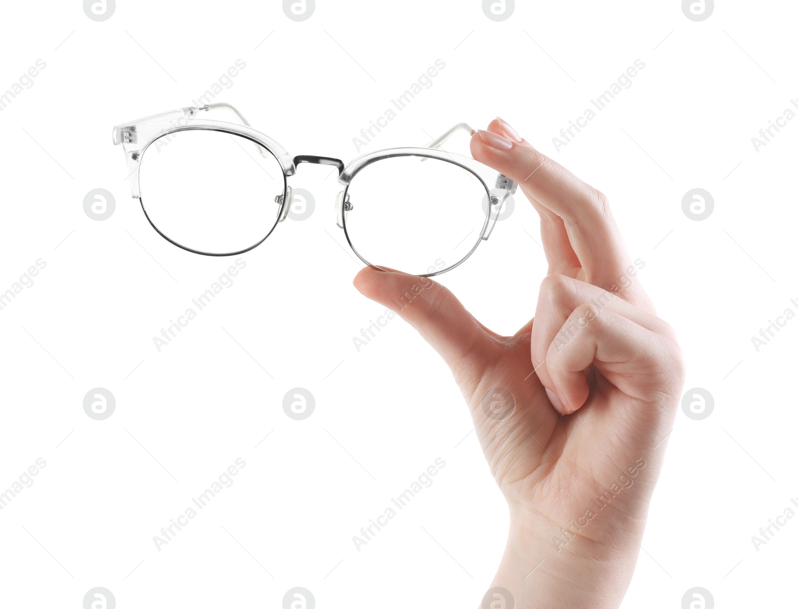 Photo of Woman holding glasses with stylish transparent frame on white background, closeup