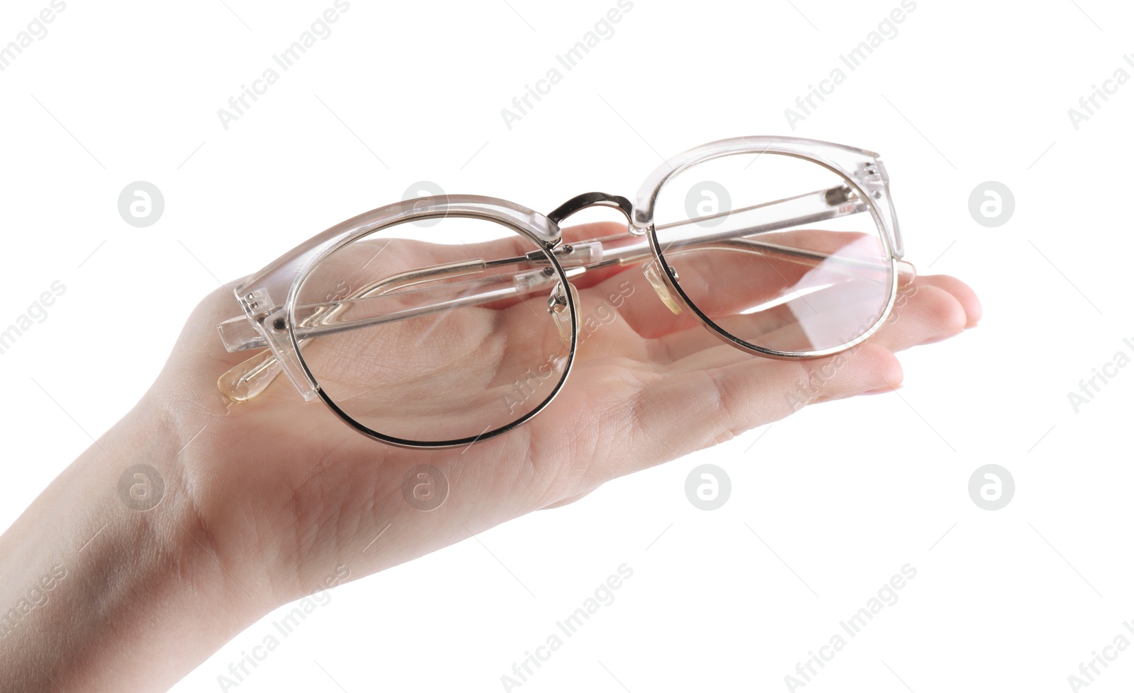 Photo of Woman holding glasses with stylish transparent frame on white background, closeup