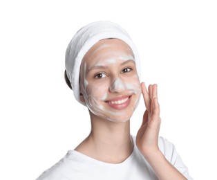 Photo of Teenage girl with cleansing foam on her face against white background. Acne treatment