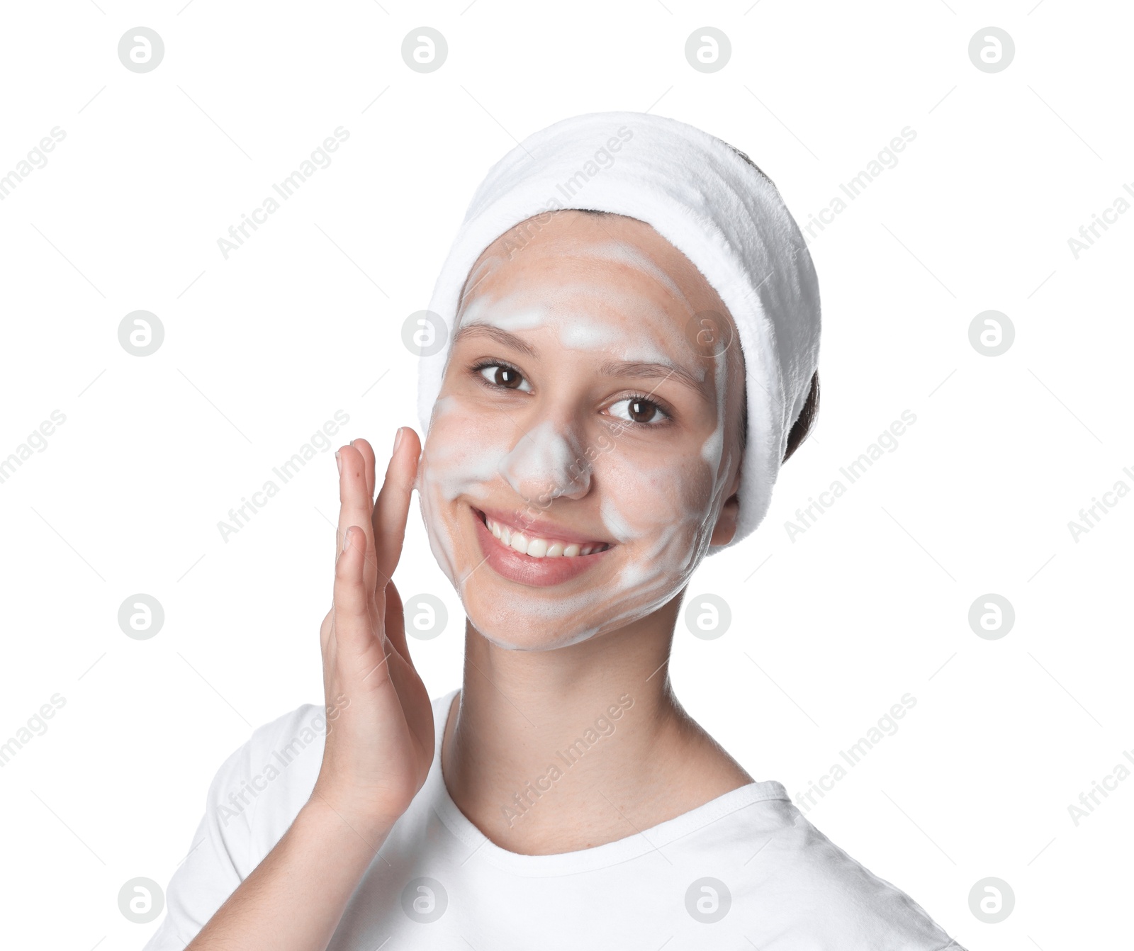 Photo of Teenage girl with cleansing foam on her face against white background. Acne treatment