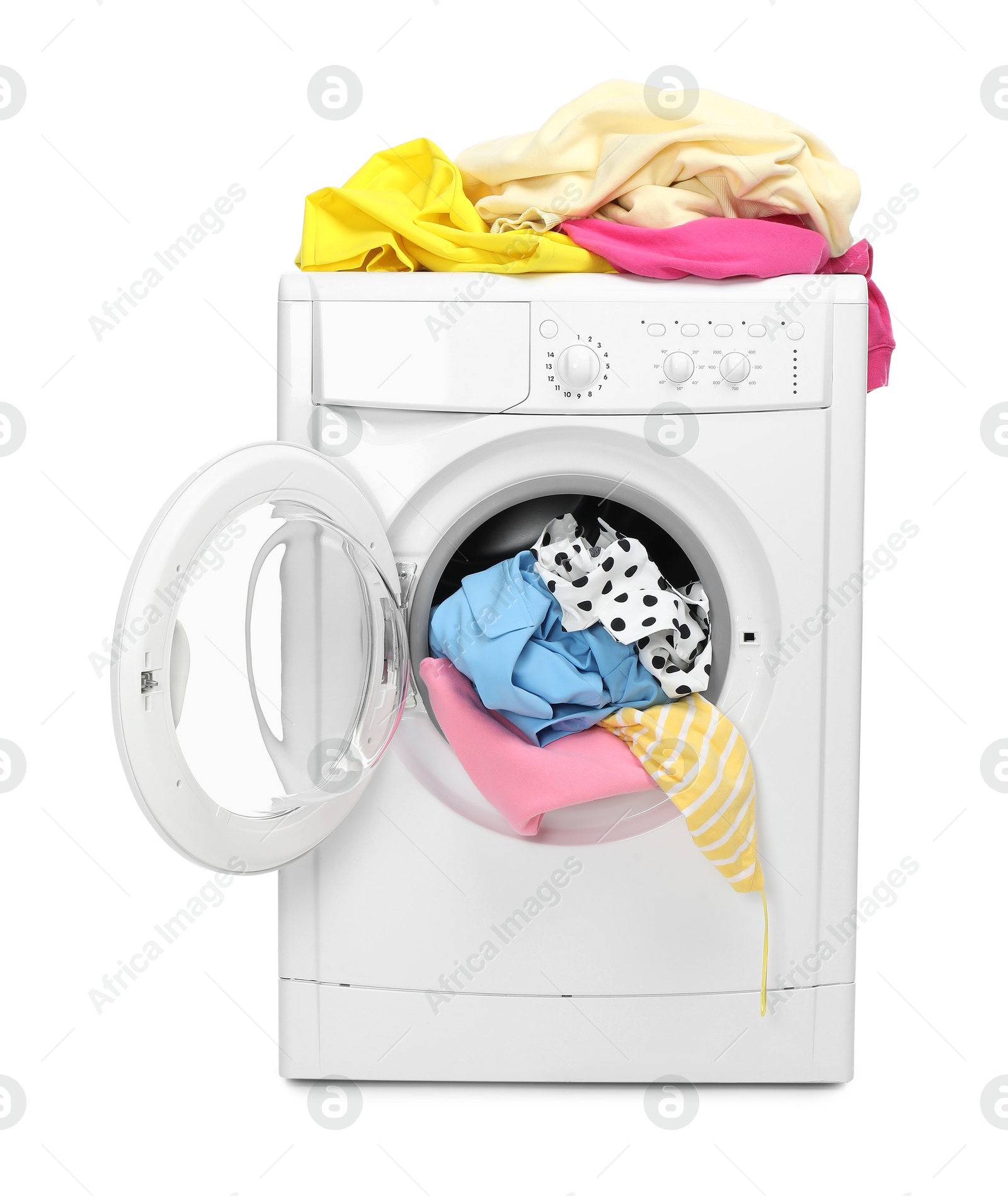 Photo of Washing machine full of colorful clothes isolated on white