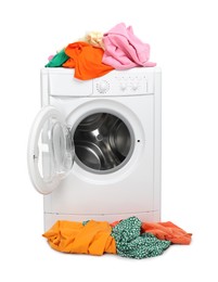 Photo of Washing machine and colorful clothes isolated on white