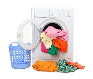 Photo of Washing machine with colorful clothes and basket isolated on white