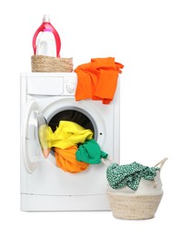 Photo of Washing machine, detergents and laundry basket with colorful clothes isolated on white