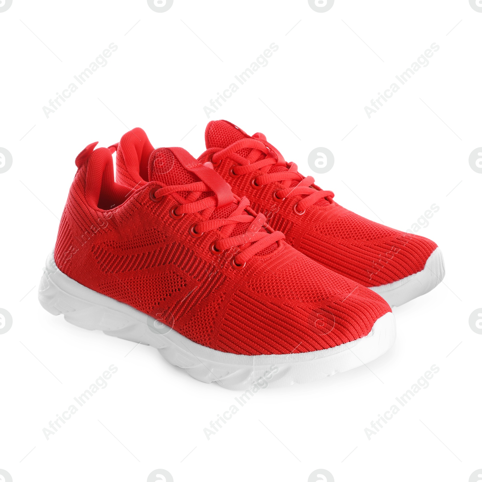 Photo of Pair of stylish red sneakers isolated on white