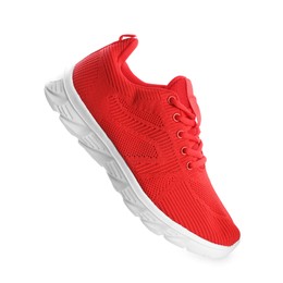 Photo of One stylish red sneaker isolated on white