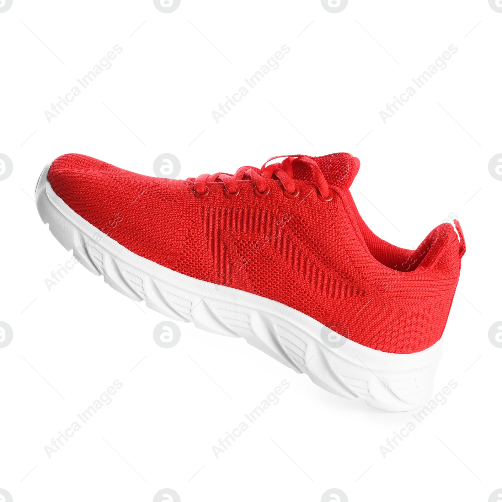 Photo of One stylish red sneaker isolated on white