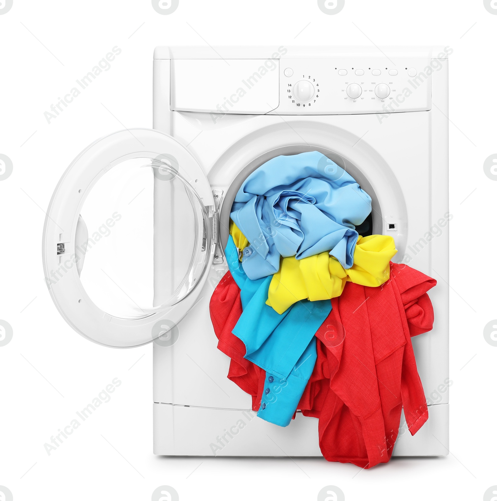 Photo of Washing machine full of colorful clothes isolated on white