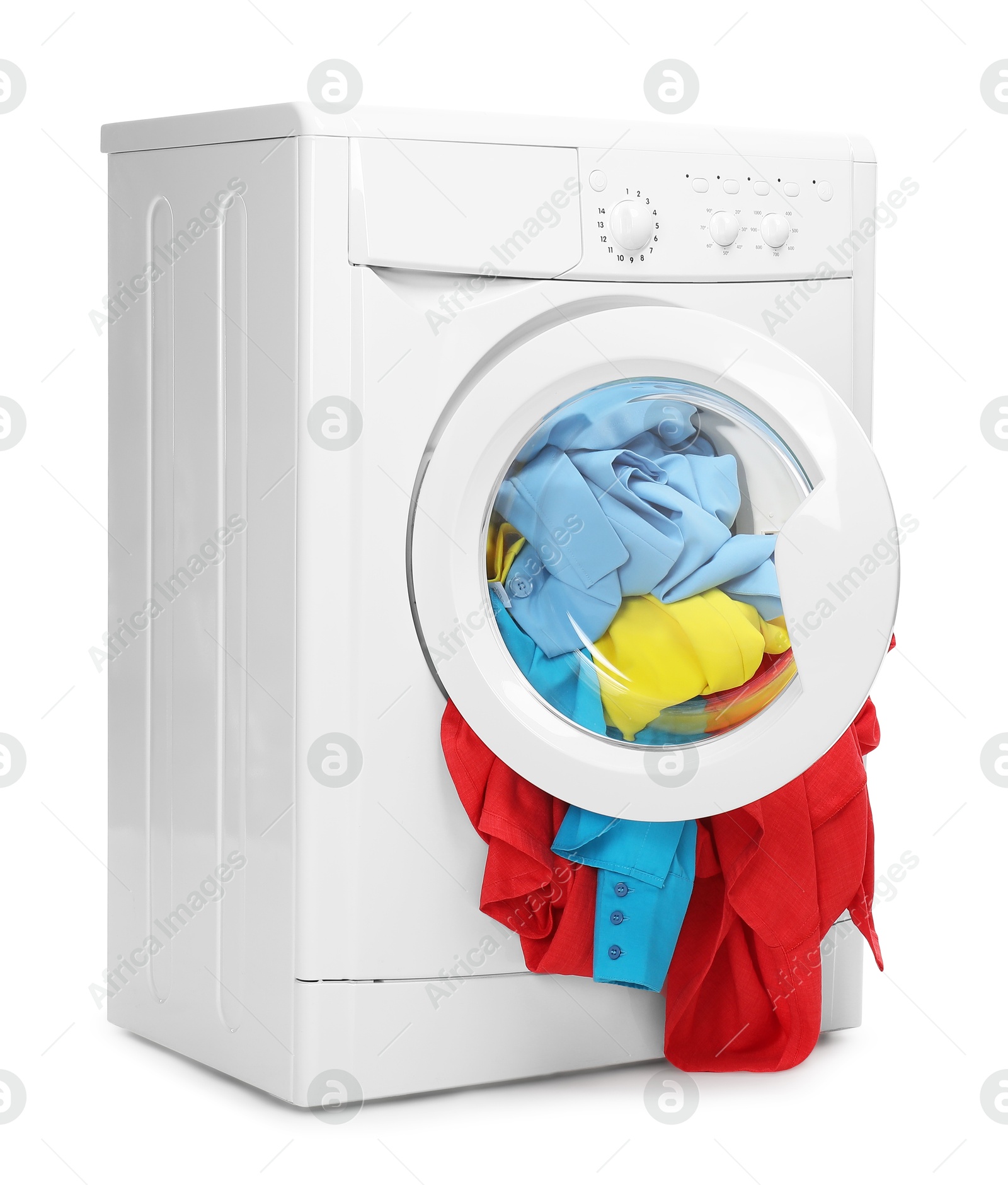 Photo of Washing machine full of colorful clothes isolated on white