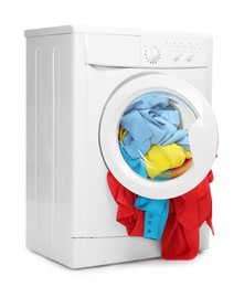 Photo of Washing machine full of colorful clothes isolated on white