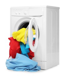 Photo of Washing machine full of colorful clothes isolated on white