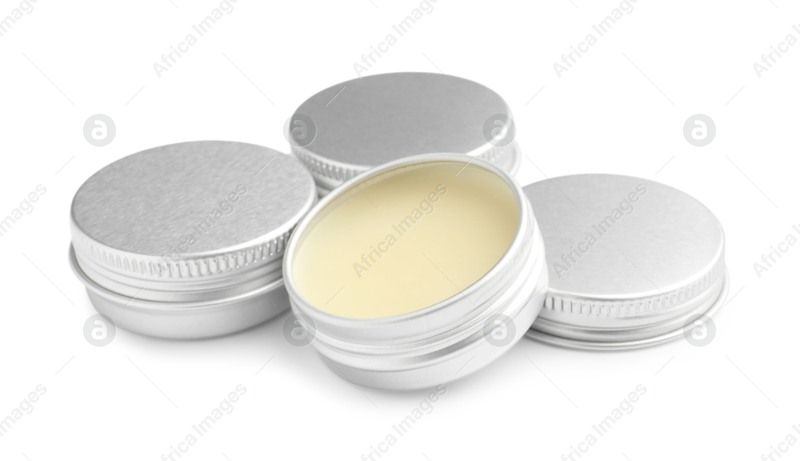 Photo of Lip balms isolated on white. Cosmetic product