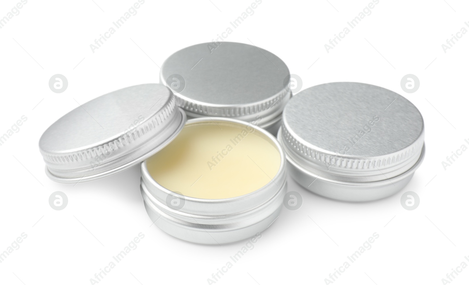 Photo of Lip balms isolated on white. Cosmetic product