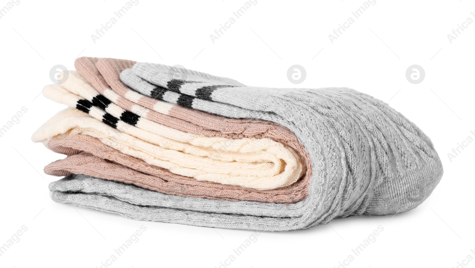 Photo of Many folded soft socks isolated on white