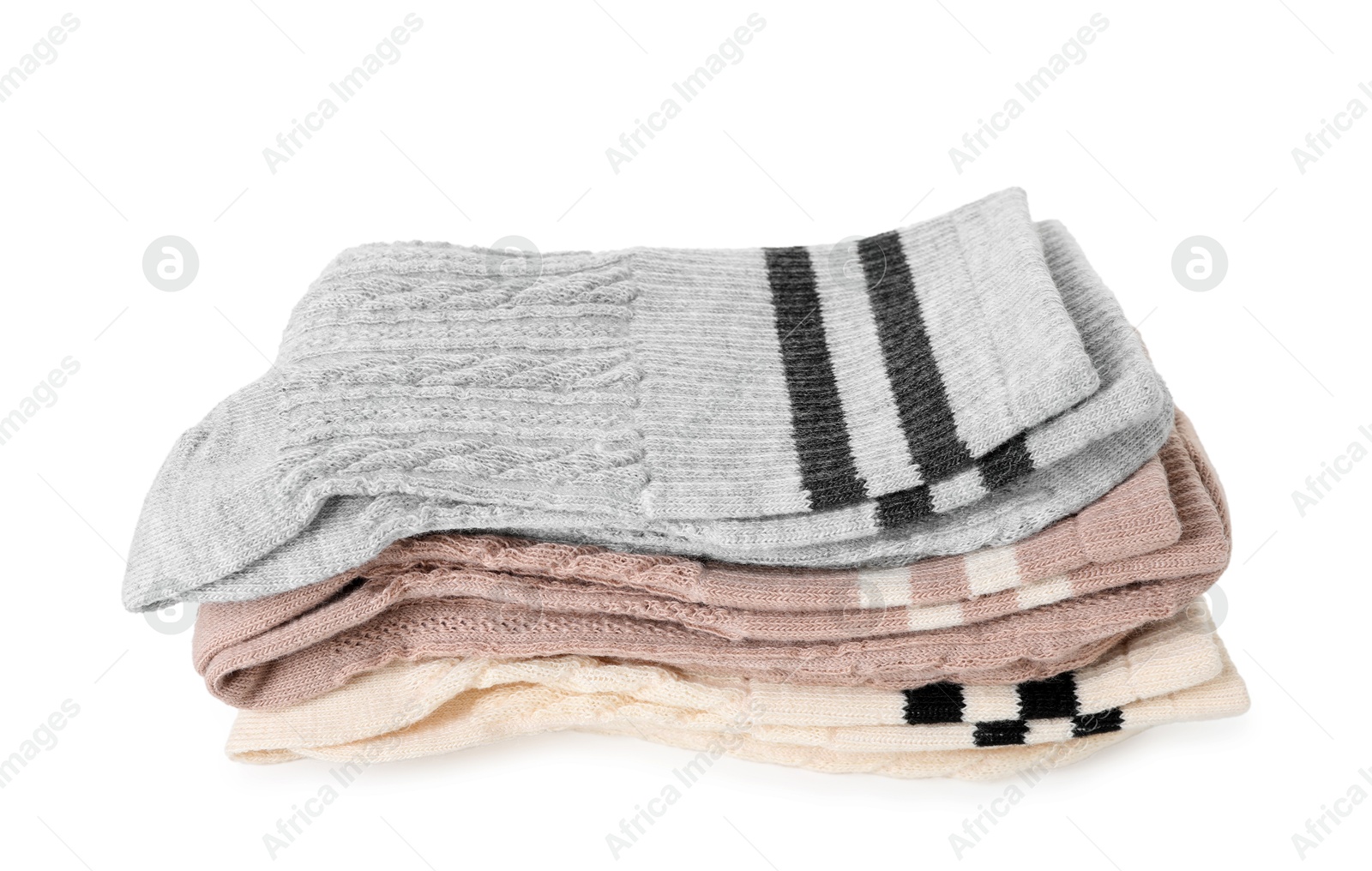 Photo of Stack of folded soft socks isolated on white