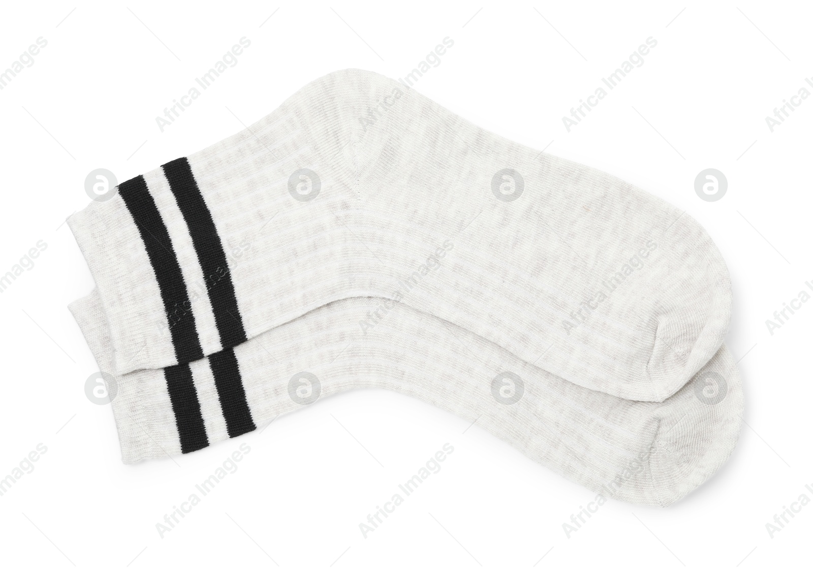 Photo of Pair of soft socks isolated on white, top view