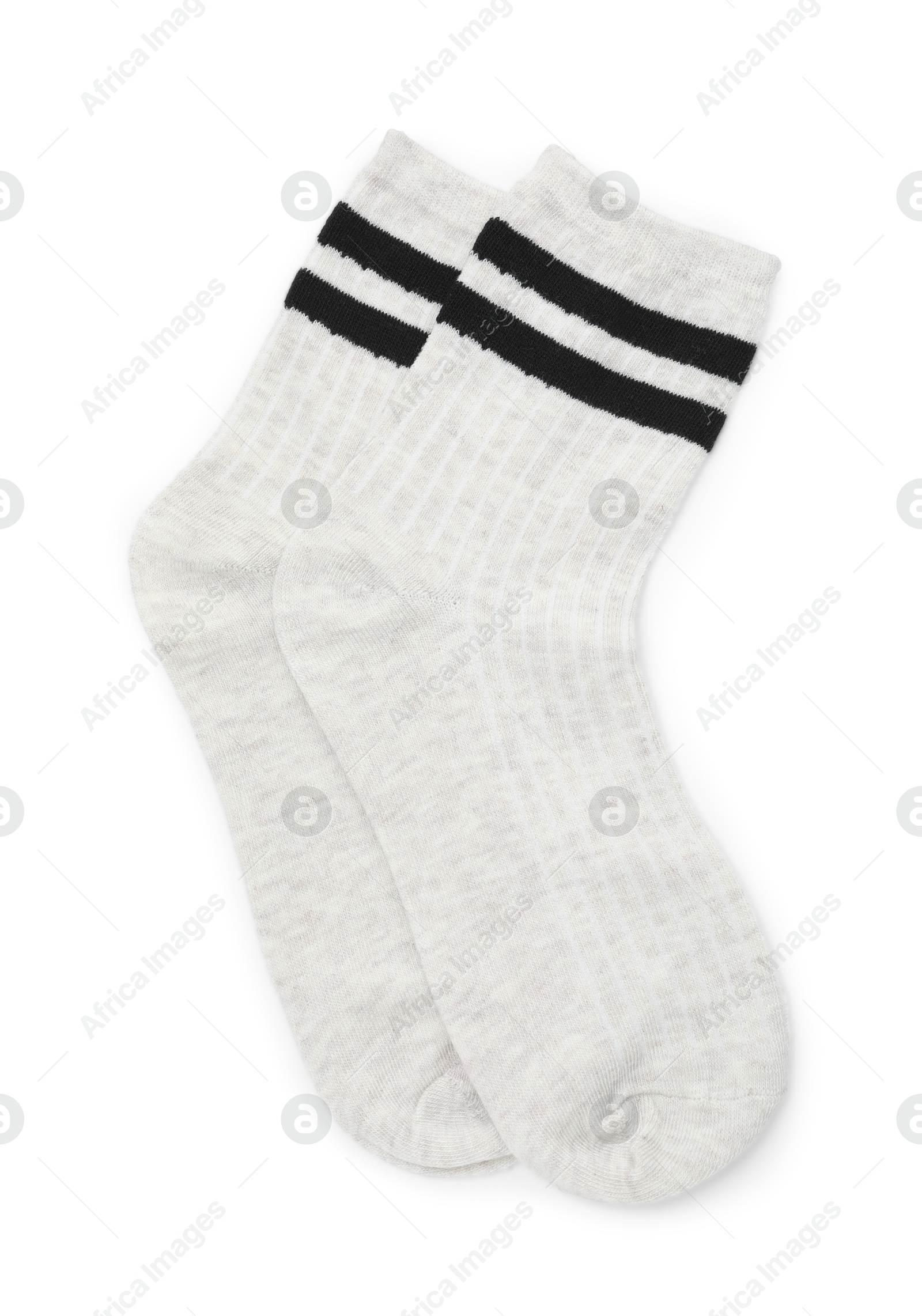 Photo of Pair of soft socks isolated on white, top view