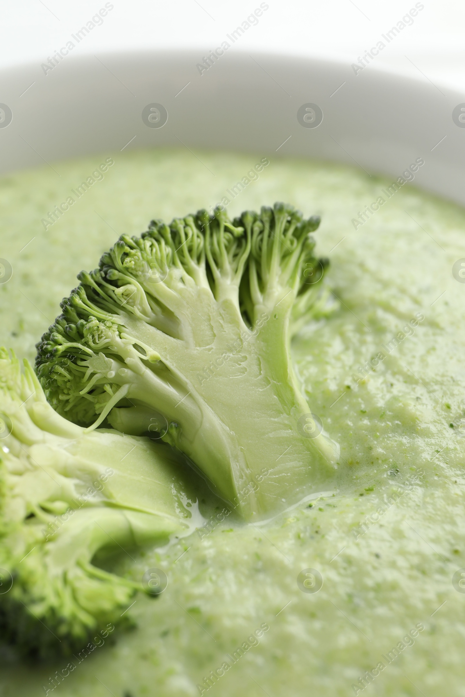 Photo of Delicious broccoli cream soup in bowl, closeup