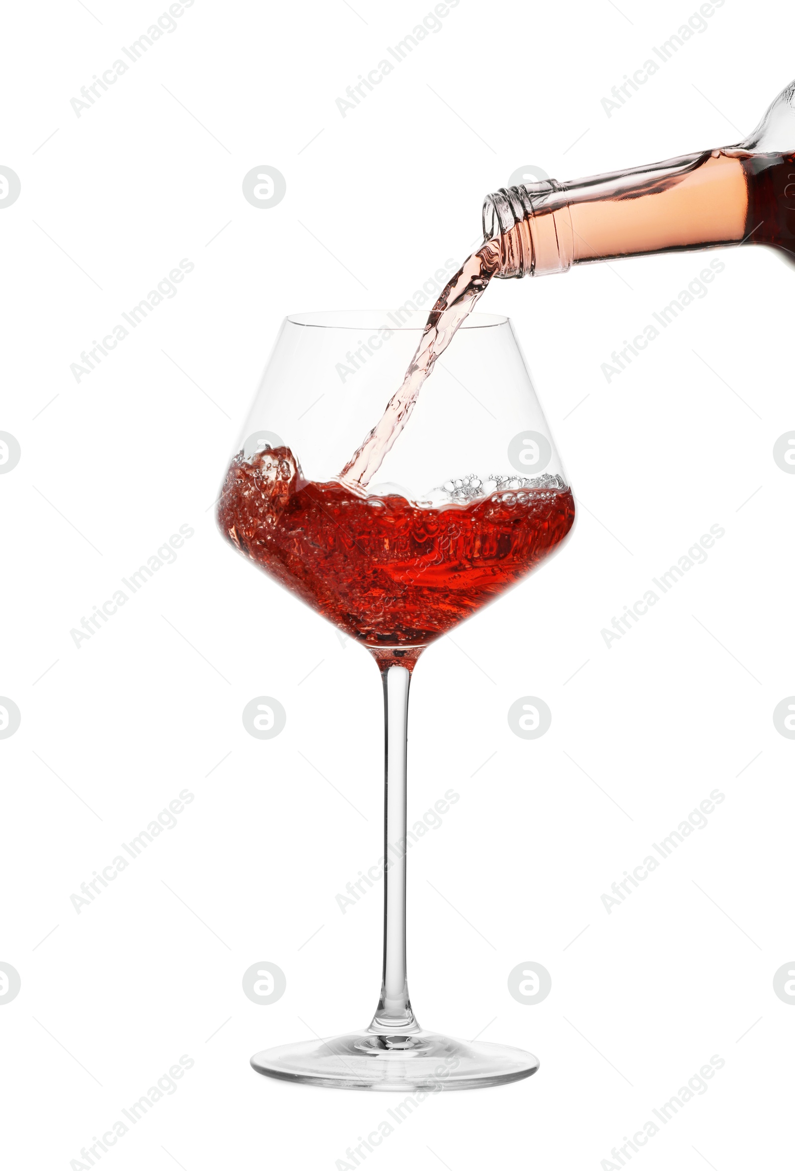 Photo of Pouring wine into glass on white background