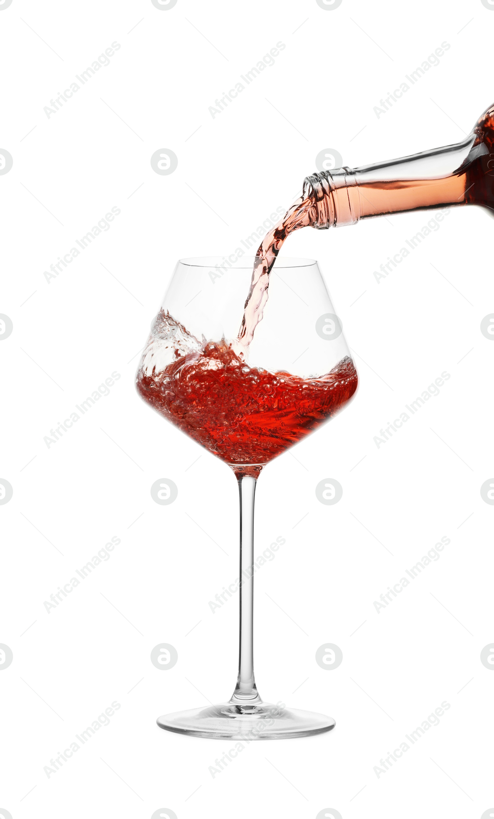 Photo of Pouring wine into glass on white background