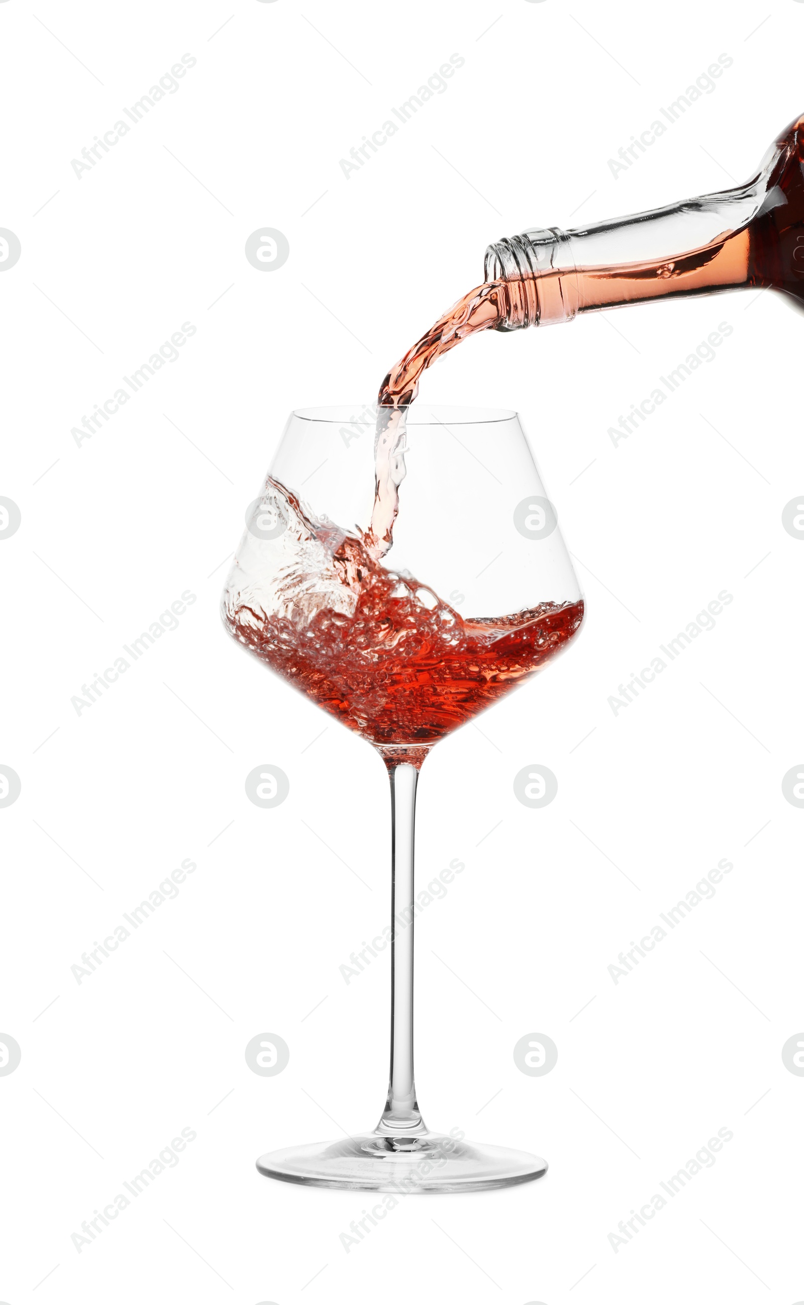 Photo of Pouring wine into glass on white background