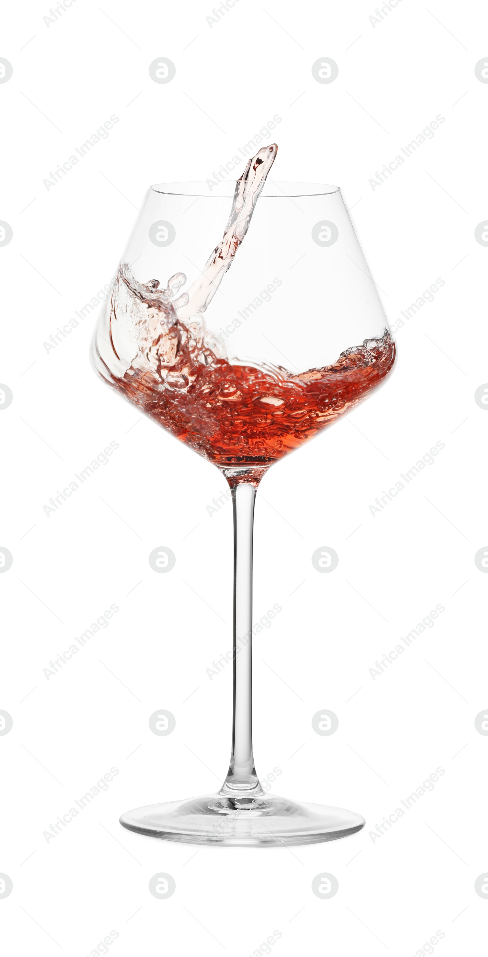 Photo of Tasty wine splashing in glass on white background