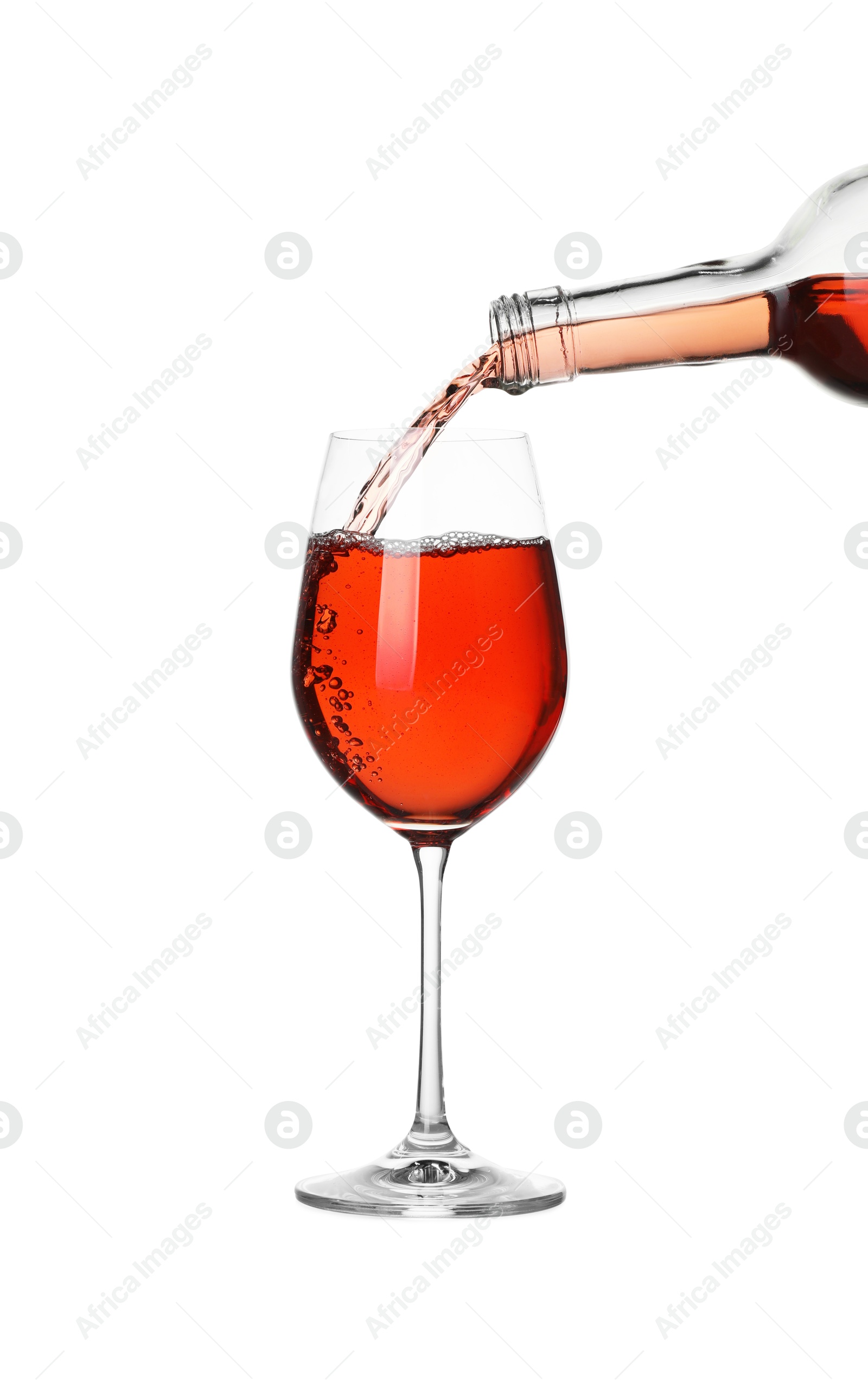 Photo of Pouring wine into glass on white background