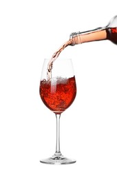 Photo of Pouring wine into glass on white background