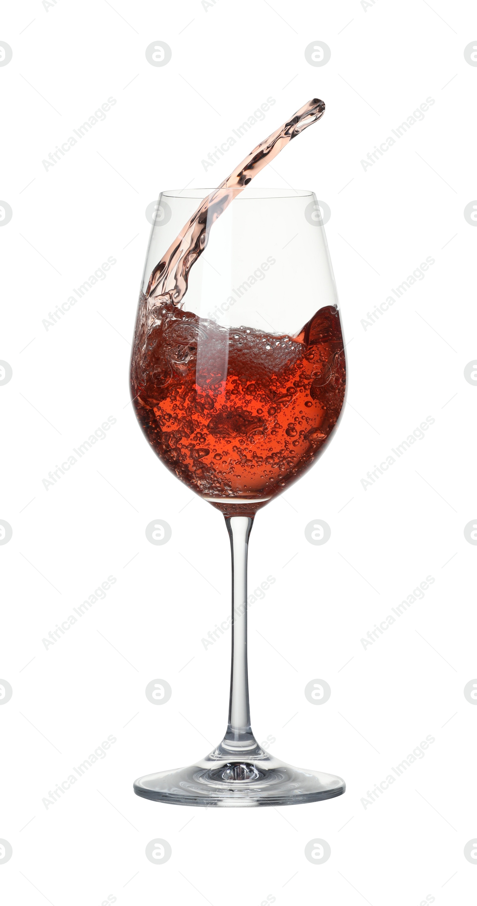 Photo of Tasty wine splashing in glass on white background