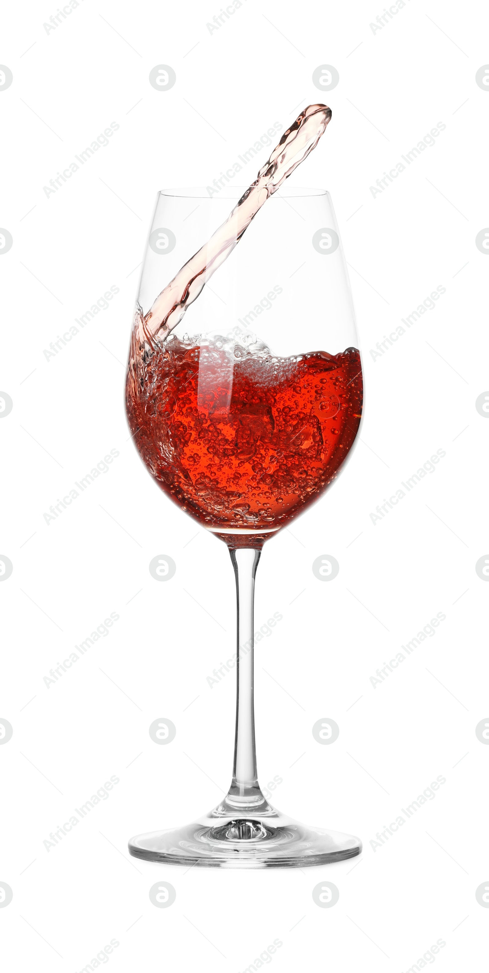 Photo of Tasty wine splashing in glass on white background