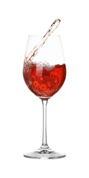 Photo of Tasty wine splashing in glass on white background