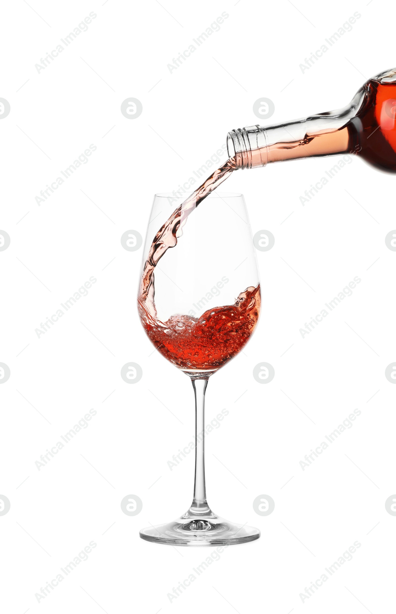 Photo of Pouring wine into glass on white background